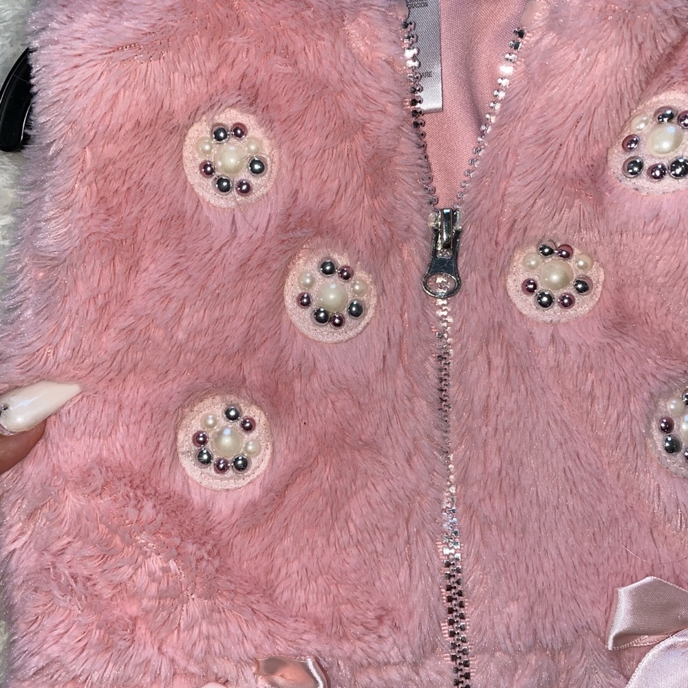 Pink furry vest